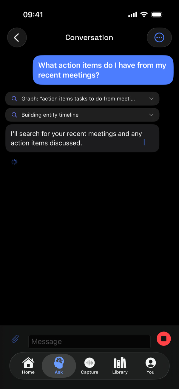 The Ask screen on iPhone streaming an answer while listing the sources it is searching.